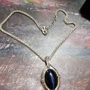 Elegant Silver and Blue Pendant Necklace Cats Eye On Rope